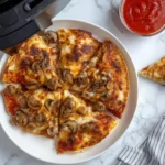 Golden brown pizza quesadilla made in an air fryer