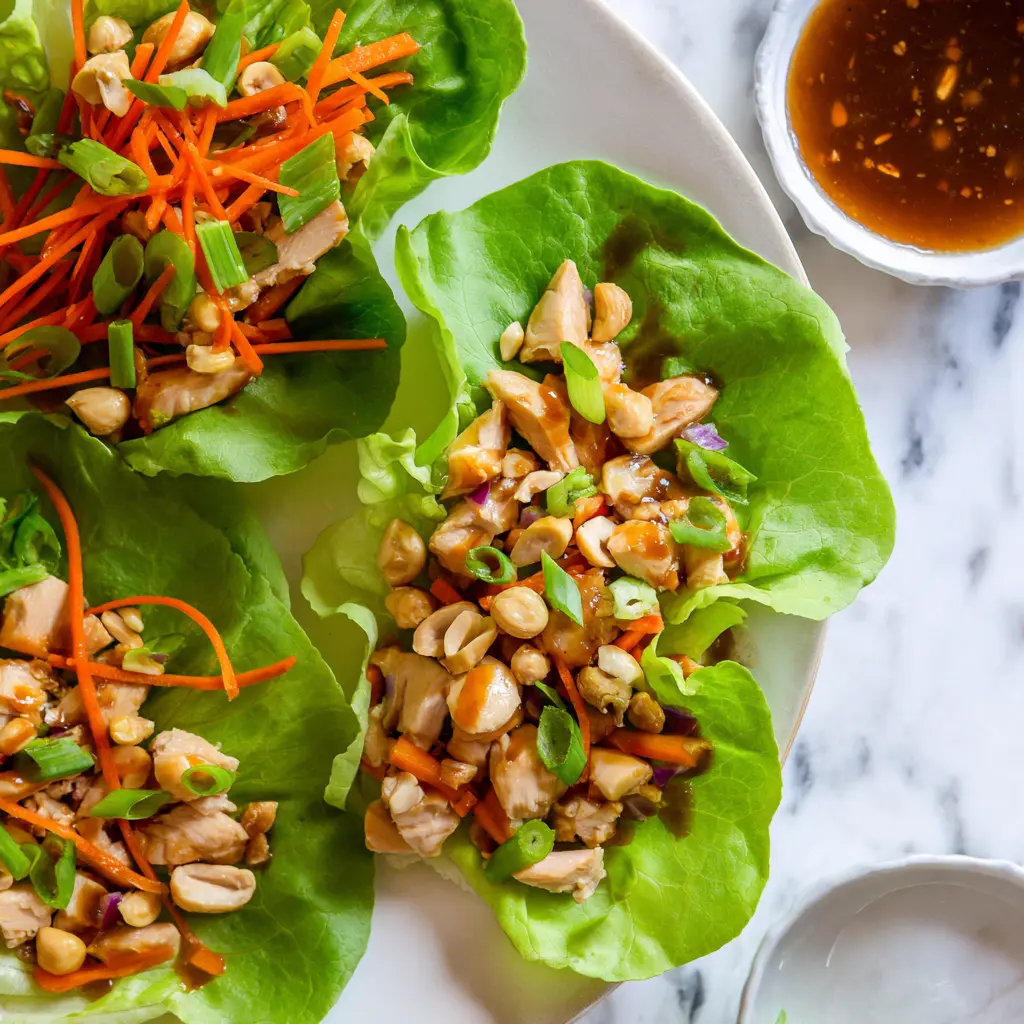 Assembling Chicken Lettuce Wraps and present